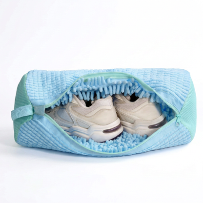 Light-blue chenille shoe washing bag with aqua zipper and cream sneakers inside